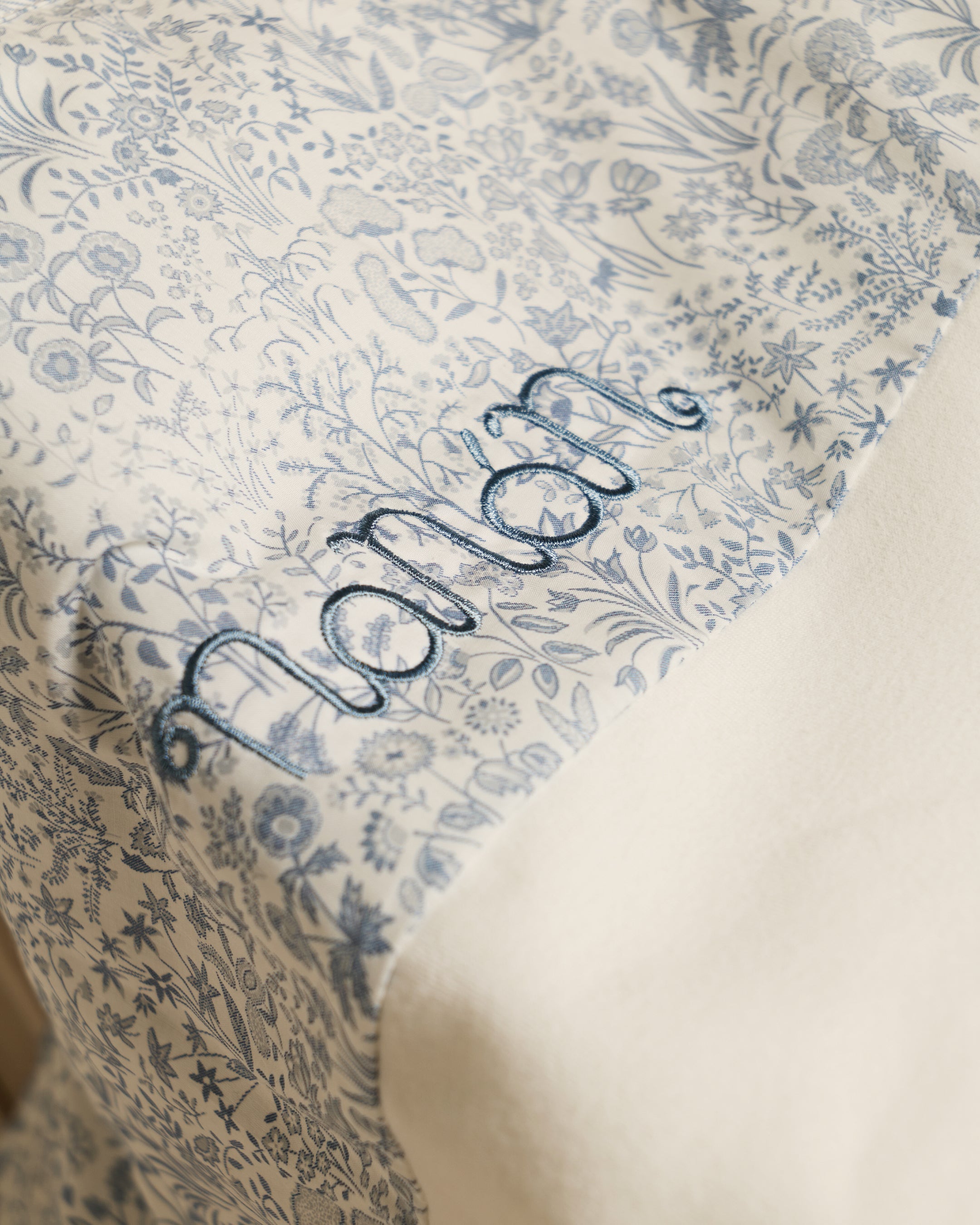 Coperta avorio in jersey con tessuto Liberty color azzurro